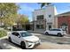 Quaint street view showing pedestrian-friendly sidewalks, decorative holiday wreaths, and inviting shopfronts at 3081 Frankie Ln, Duluth, GA 30096