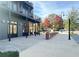 Charming street view showing pedestrian sidewalks, a mix of commercial buildings, and colorful foliage at 3081 Frankie Ln, Duluth, GA 30096