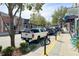 Charming street view features local shops, pedestrian-friendly sidewalks, and decorative foliage and trees at 3081 Frankie Ln, Duluth, GA 30096