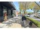 Charming street view includes sidewalk benches, local businesses and tree-lined streets at 3081 Frankie Ln, Duluth, GA 30096