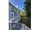 Exterior view of the back deck with a landscaped backyard at 365 Morning Dew Cir, Roswell, GA 30075
