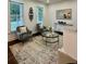 Cozy sitting room features modern decor and ample natural light at 365 Morning Dew Cir, Roswell, GA 30075