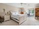 Cozy bedroom with a comfortable bed, desk area, and natural light, perfect for relaxation and productivity at 3990 Wesley Chapel Rd, Marietta, GA 30062