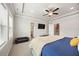 Spacious bedroom with TV, ample closet space, and a decorative throw blanket at 4776 Highside Way, Smyrna, GA 30082