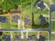 Aerial view of property highlighting backyard, landscaping, and neighborhood at 7820 Longview Dr, Cumming, GA 30041