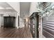 Welcoming entryway with dark hardwood floors, high ceilings, decorative furniture and stylish decorative elements at 7820 Longview Dr, Cumming, GA 30041