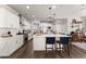 Modern kitchen with a large island, stainless steel appliances, and a clean, white aesthetic at 7820 Longview Dr, Cumming, GA 30041