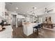 Spacious kitchen with a large island, stainless steel appliances, and an adjacent dining area at 7820 Longview Dr, Cumming, GA 30041