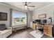 Home office with lots of natural light and wood flooring at 7820 Longview Dr, Cumming, GA 30041