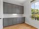 Modern kitchen with gray cabinets, marble countertops and stainless steel hardware at 2196 Niles Ne Pl, Atlanta, GA 30324