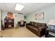 Finished basement with a sofa, desk, and shelving at 2621 Garland Way, Duluth, GA 30096