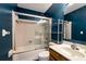 Bathroom featuring a shower with sliding glass doors, toilet, and vanity with white sink at 2621 Garland Way, Duluth, GA 30096