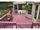 Lovely wooden deck featuring a screened porch and space for outdoor lounging at 2621 Garland Way, Duluth, GA 30096
