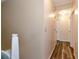 Hallway with appealing paint and wood flooring leads to multiple rooms at 2621 Garland Way, Duluth, GA 30096