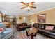 Open living area featuring wood flooring and seamless access to the dining and kitchen areas at 2621 Garland Way, Duluth, GA 30096