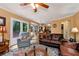 Spacious living room showcases wood-look floors and a cozy layout for entertaining at 2621 Garland Way, Duluth, GA 30096