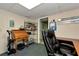 Office space featuring a desk, chair, and shelving unit at 2621 Garland Way, Duluth, GA 30096
