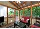 Relaxing screened-in porch with nice views of the outdoors, great for entertaining at 2621 Garland Way, Duluth, GA 30096