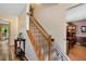 Stairway with chair lift and adjacent dining area with an inviting interior at 2621 Garland Way, Duluth, GA 30096