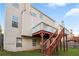 Backyard with a wood deck, stairs to the yard and a privacy fence at 3460 Drayton Manor Run, Lawrenceville, GA 30046