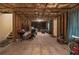 Unfinished basement with exposed beams and insulation offering plenty of potential storage and customization options at 3460 Drayton Manor Run, Lawrenceville, GA 30046