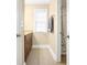 Bathroom featuring a vanity, window, and shower with patterned curtain at 3460 Drayton Manor Run, Lawrenceville, GA 30046