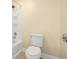 Bright bathroom with a shower-tub combination and a white toilet at 3460 Drayton Manor Run, Lawrenceville, GA 30046