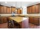 Spacious kitchen featuring wooden cabinets, granite countertops, and stainless steel appliances at 3460 Drayton Manor Run, Lawrenceville, GA 30046