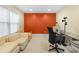 Bright office space with a large window, comfortable seating, and a functional desk creates a productive environment at 3460 Drayton Manor Run, Lawrenceville, GA 30046