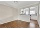 Dining room with hardwood floors with view into kitchen area at 4282 Roswell Ne Rd # K3, Atlanta, GA 30342