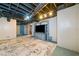 Finished basement with stylish carpet, painted ceiling and walls, and custom entertainment center at 884 Edgewater Cir, Marietta, GA 30062
