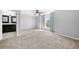 Spacious bedroom with neutral carpet, bright window, and ensuite bathroom at 884 Edgewater Cir, Marietta, GA 30062