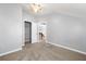 Neutral bedroom featuring neutral carpeting and a closet at 884 Edgewater Cir, Marietta, GA 30062