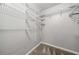 Empty walk-in closet with carpet and metal shelving at 884 Edgewater Cir, Marietta, GA 30062
