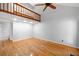 Living room showcasing a vaulted ceiling with loft and hardwood floors at 884 Edgewater Cir, Marietta, GA 30062