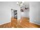 Bright and airy living room boasts hardwood floors and a decorative chandelier at 884 Edgewater Cir, Marietta, GA 30062