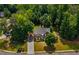 Aerial view of a beautiful home nestled among mature trees and well-kept landscaping at 1120 Bagwell Dr, Kennesaw, GA 30152