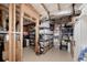 Unfinished basement with boxes and shelves full of storage containers at 1120 Bagwell Dr, Kennesaw, GA 30152