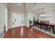 Formal dining room featuring hardwood floors, large windows, and a modern chandelier at 1120 Bagwell Dr, Kennesaw, GA 30152