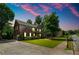 Well-maintained two-story home featuring a spacious driveway and a lush green lawn at 1120 Bagwell Dr, Kennesaw, GA 30152