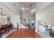 Spacious foyer with hardwood floors, staircase, and views into the dining and sitting rooms at 1120 Bagwell Dr, Kennesaw, GA 30152
