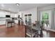 Bright kitchen with island, stainless appliances and an adjacent dining area with backyard access at 1120 Bagwell Dr, Kennesaw, GA 30152
