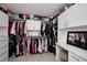 Well-organized walk-in closet with shelving and clothes racks for optimal storage at 1120 Bagwell Dr, Kennesaw, GA 30152