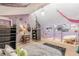 Spacious bedroom with painted accents, desk and hanging hammock at 2229 S Van Wert S Rd, Villa Rica, GA 30180