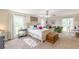 Spacious bedroom with ample natural light, seating area, and sliding door access to deck at 2229 S Van Wert S Rd, Villa Rica, GA 30180