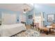 Vaulted ceiling bedroom with plenty of natural light and seating area at 2229 S Van Wert S Rd, Villa Rica, GA 30180
