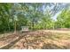 Large, fenced-in chicken coop with a coop and ample space for chickens at 2229 S Van Wert S Rd, Villa Rica, GA 30180