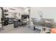 Commercial kitchen featuring stainless steel sinks, preparation areas, and shelving units for efficient food processing at 2229 S Van Wert S Rd, Villa Rica, GA 30180