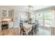 Dining area with elegant lighting fixture and view to the yard at 2229 S Van Wert S Rd, Villa Rica, GA 30180