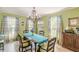 Charming dining room features hardwood floors, and natural lighting, creating a warm atmosphere at 2229 S Van Wert S Rd, Villa Rica, GA 30180